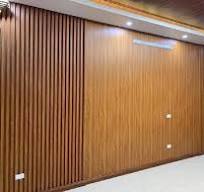 Decorative ceiling panel with white and gold accents